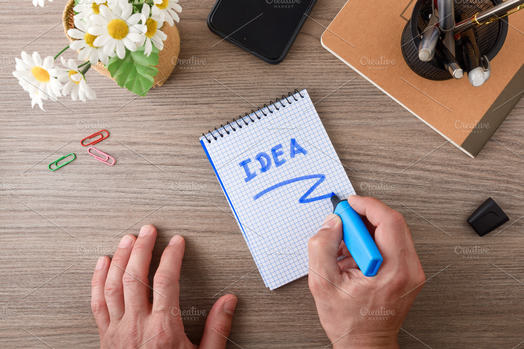 Writing Business Idea on Notepad at Desk, a Business Photo by Davizro's Market