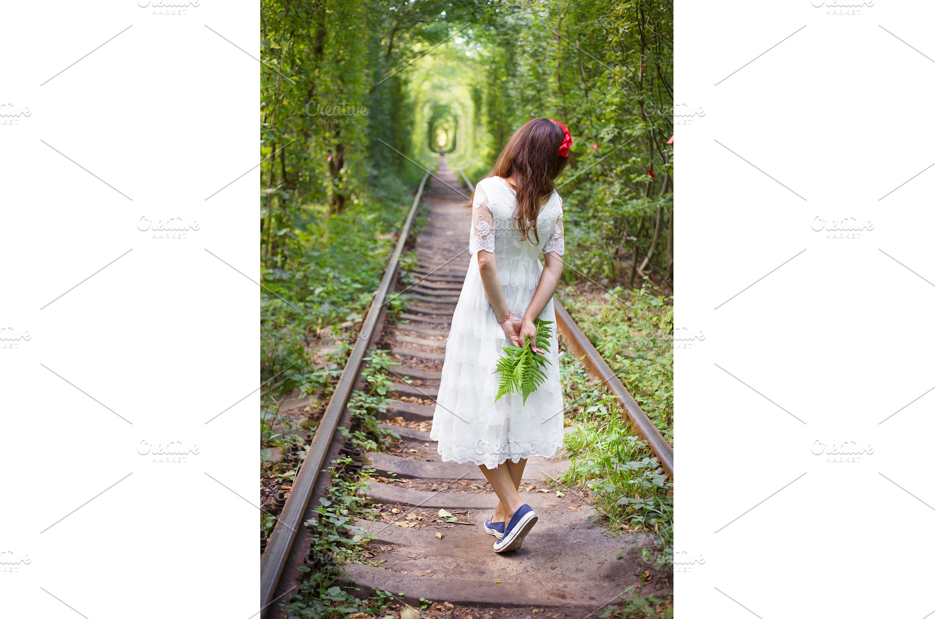 girl holding fern, tunnel of love, a Nature Photo by Artsaba Family