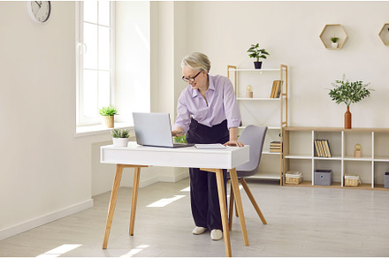 Happy businesswoman working on her, a Person Photo by StudioRomantic