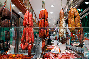 A traditional food market stall with a variety of cured sausages A Taste of Gas, a Food & Drink Photo by Bepslabor