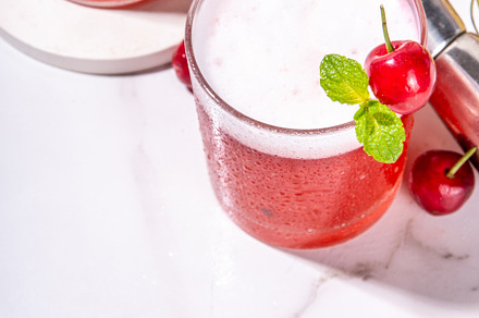 Cherry and lime alcoholic booze cocktail, a Food & Drink Photo by Rimma
