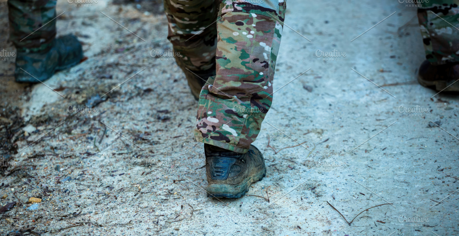 Soldier wearing camouflage pants and boots walking on a dirt road, a Sports & Recreation Photo by Antonio Gravante Market