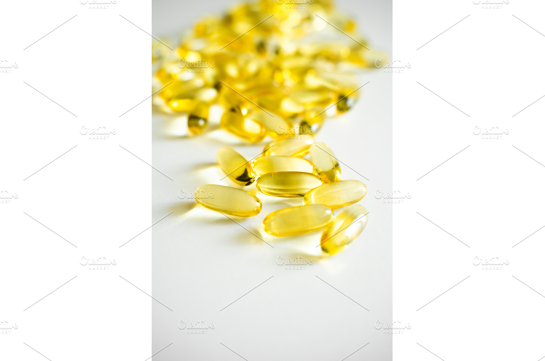Close-up of shiny fish oil capsules, a Health & Medical Photo by volodymyrshtun13795