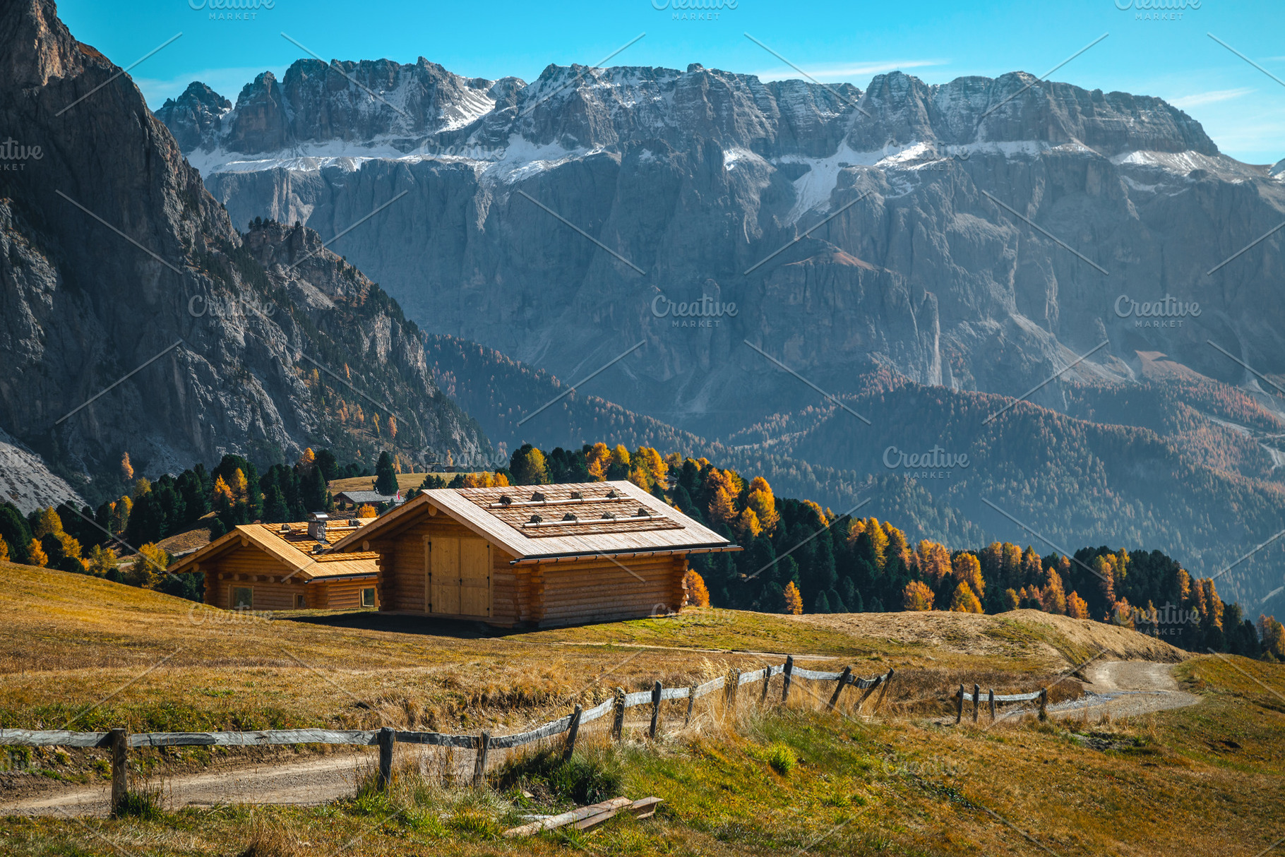 Wooden huts on the alpine pasture, a Nature Photo by Alpine Dreams
