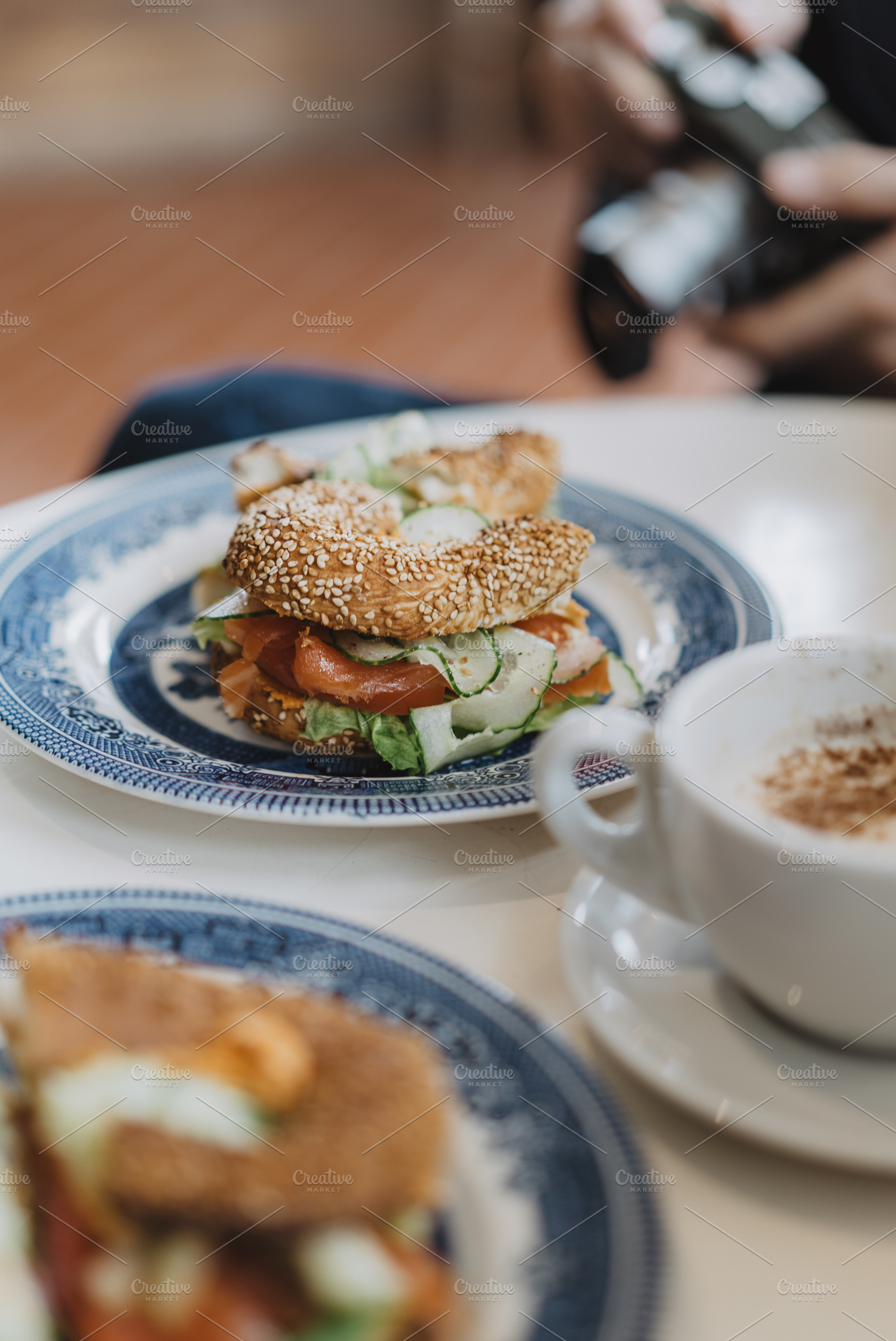 Bagel with salmon and cucumber, a Food & Drink Photo by Anastasia Dudka
