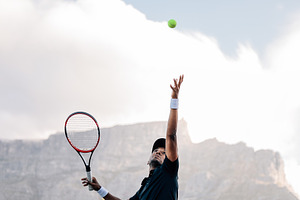 Professional tennis player throwing, a Sports & Recreation Photo by Artem Varnitsin