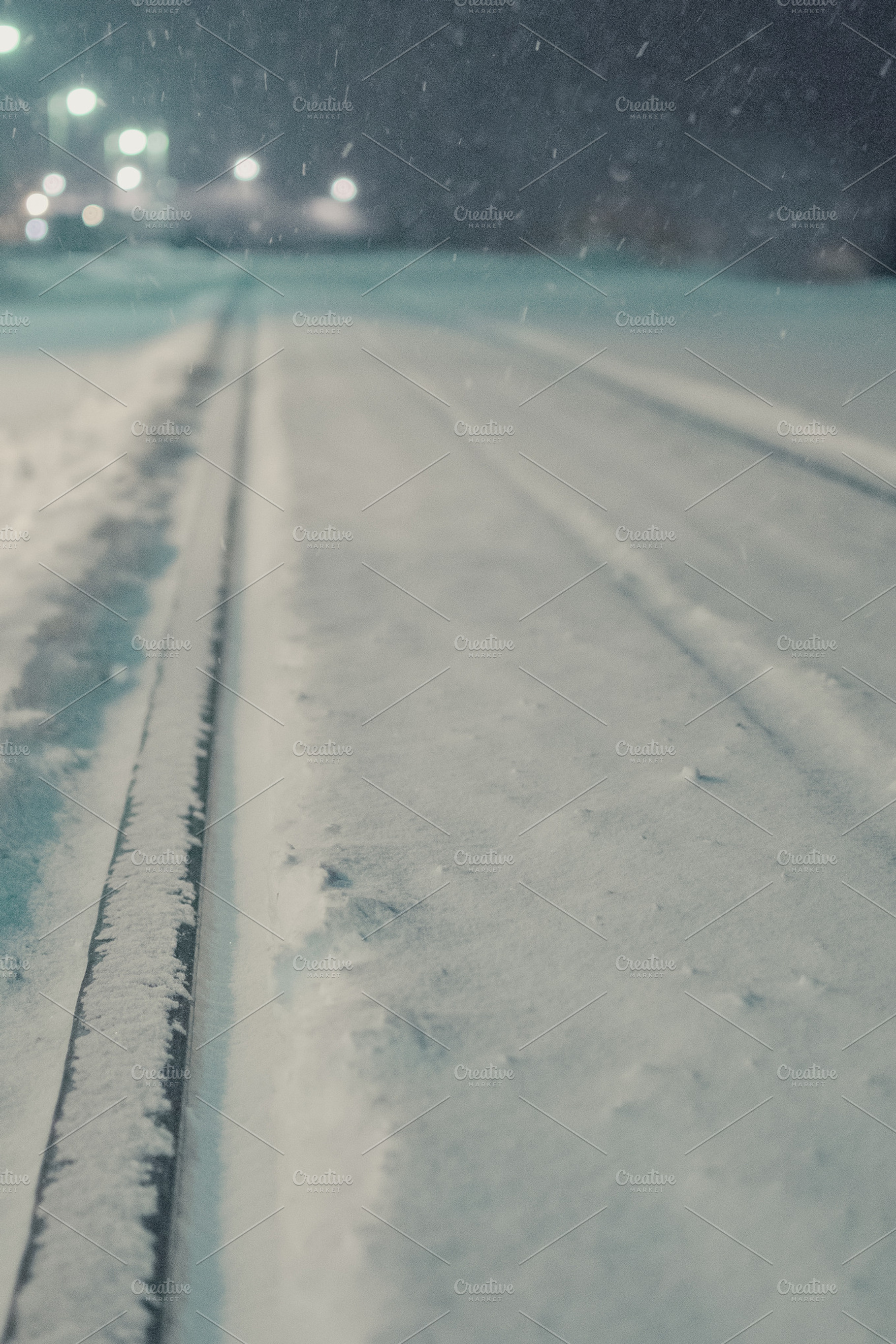 Train Tracks covered in snow, an Abstract Photo by Suzo Images