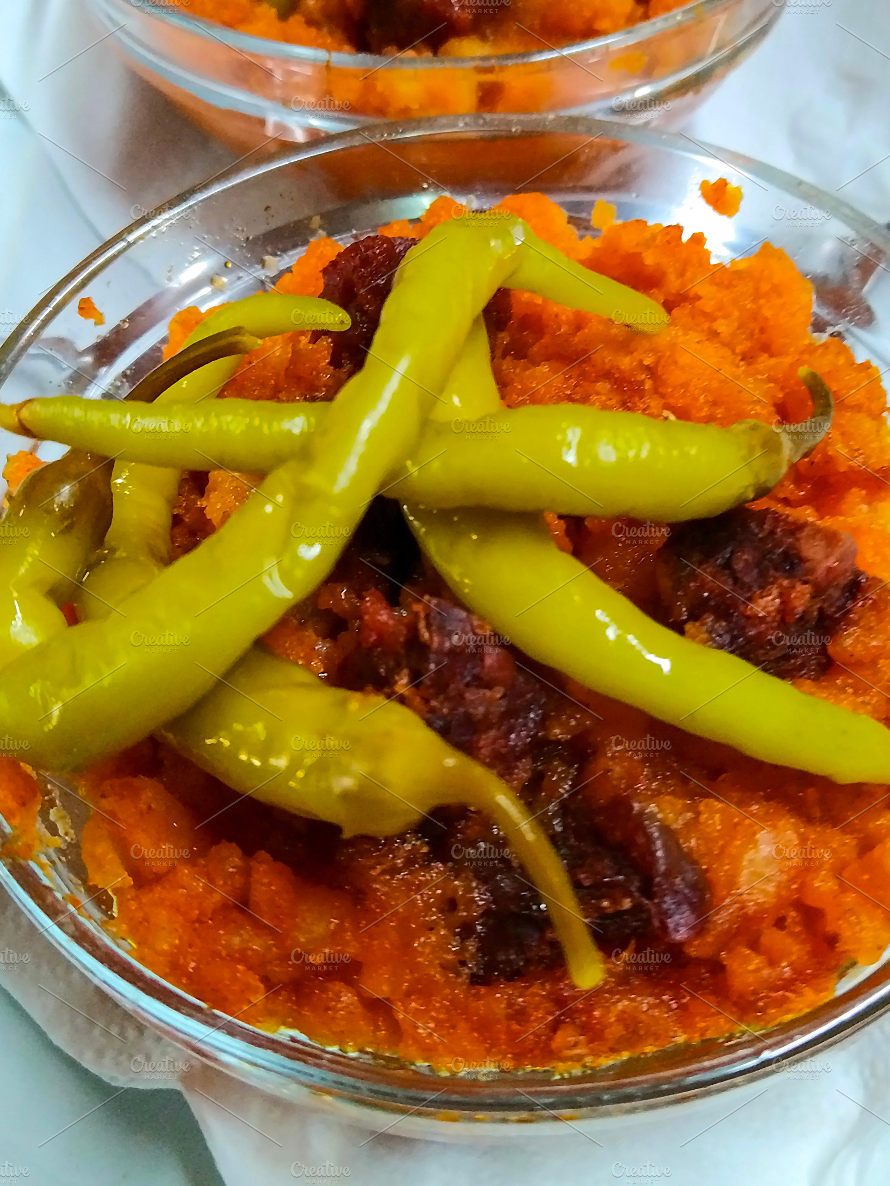 Spanish migas with chorizo and peppers in tavern setting, a Food & Drink Photo by DanFLCreativo