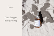 Glass Dropper Bottle Mockup, a Packaging Mockup by Copal (Thumbnail 1 of 11)