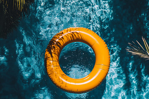 Bright orange inflatable ring floats, a Sports & Recreation Photo by MistyDay