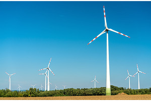 Turbines at a wind farm in austria featuring wind, energy, and power, a Technology Photo by Leonid Andronov