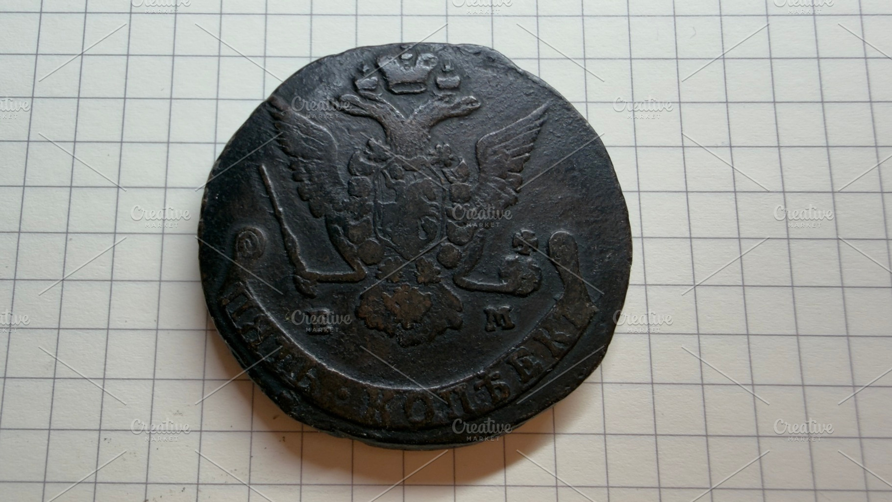 An old Russian Empire 5 kopecks Catherine II coin featuring a coat of arms with, an Industrial Photo by Textures & Backgrounds