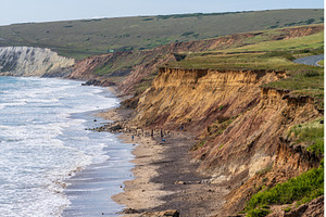 Eroding cliffs into the ocean in, a Nature Photo by Backyard Stock