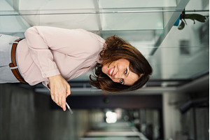A portrait of businesswoman resting, a Business Photo by HalfPoint