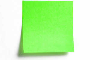 Green sticky note isolated on white, a Business Photo by BOOCYS