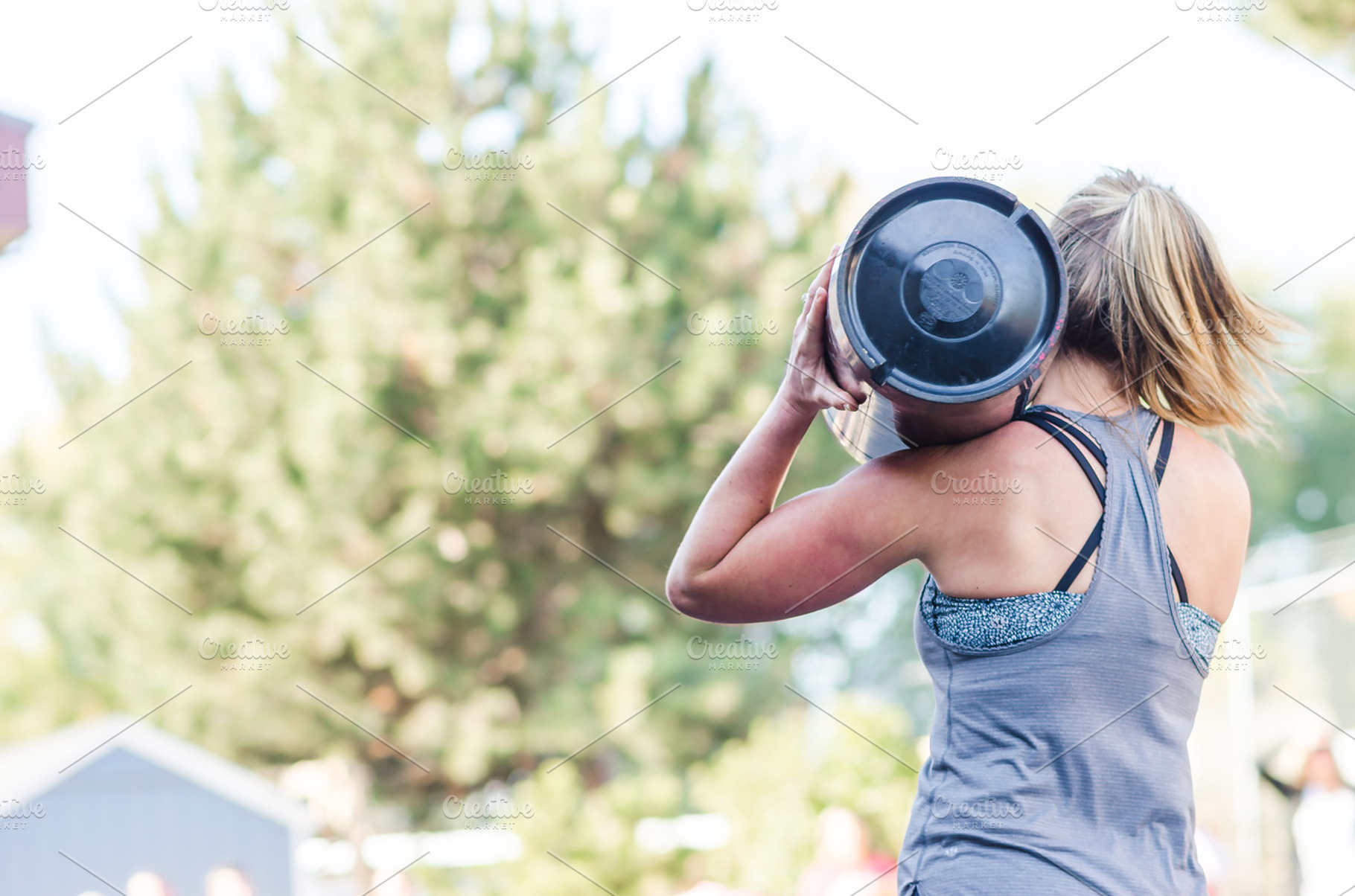 Crossfit barrel carry  woman containing crossfit, fitness, and gym, a Sports & Recreation Photo by Frizz Studio