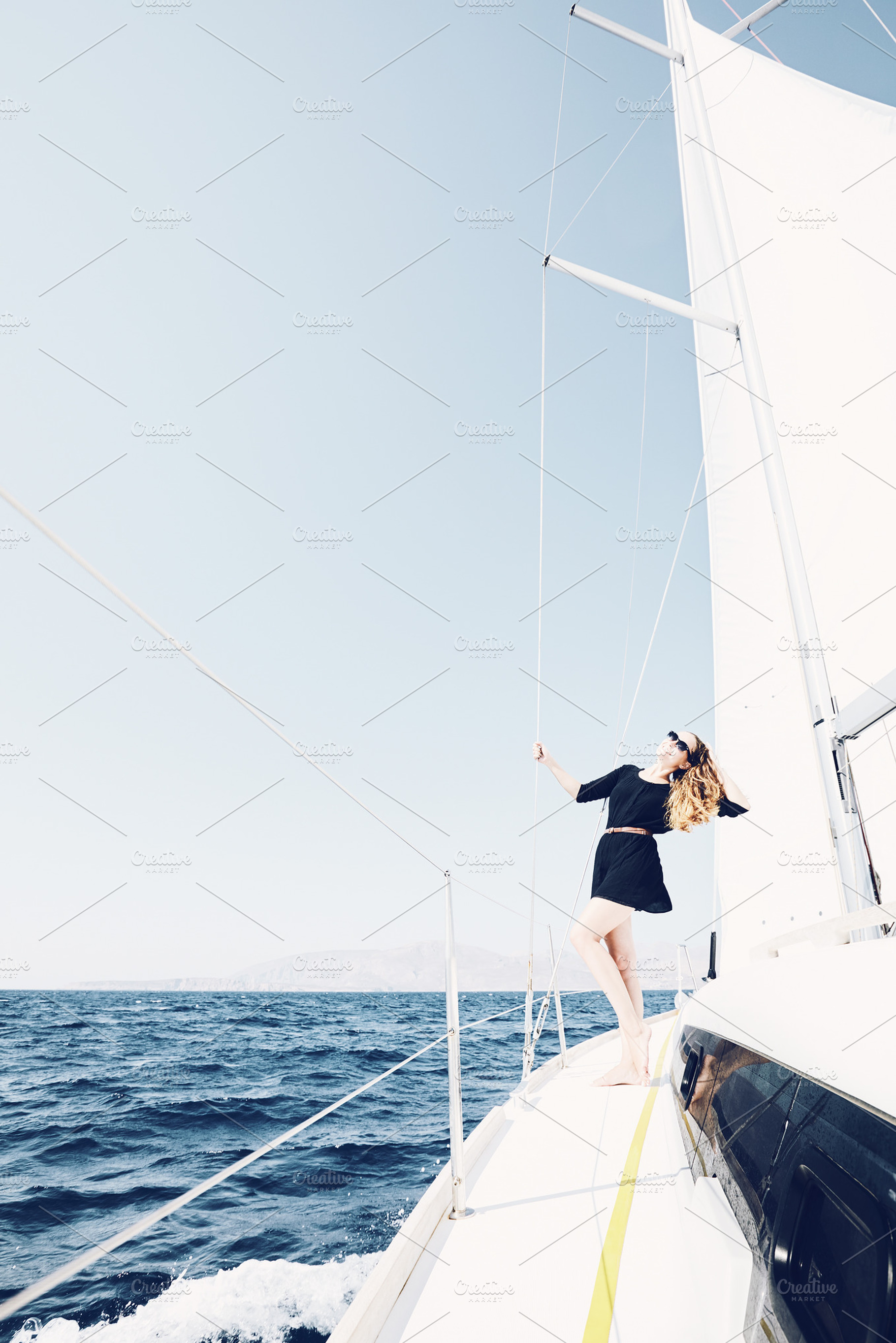 Girl on sailing boat featuring active, adventure, and boating, a Transportation Photo by Sergey Furtaev