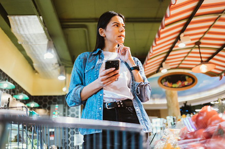 Brunette woman with mobile phone, a Person Photo by progressman