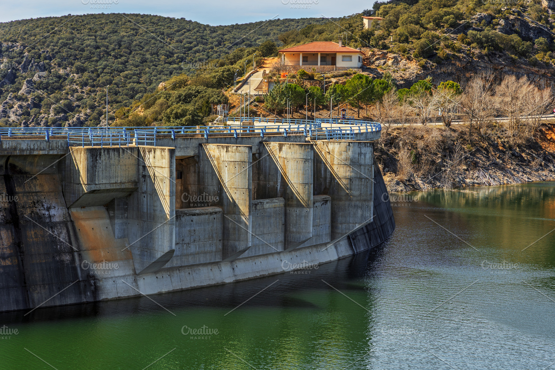 Concrete Dam with Water Reservoir in, an Industrial Photo by Perpis