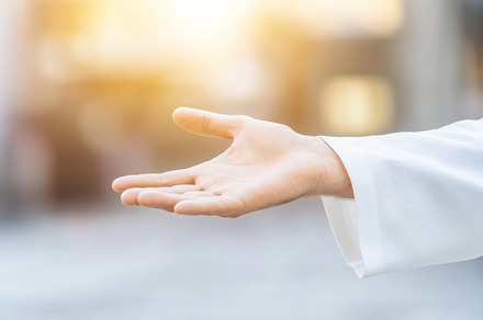 Hand of Jesus reaching out with light in spiritual scene, copy s, a Photo by Dvoevnore photos
