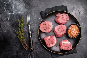 Tender fresh pork medallion, raw tenderloin meat perfect for ele, a Food & Drink Photo by composter-box@mail.ru