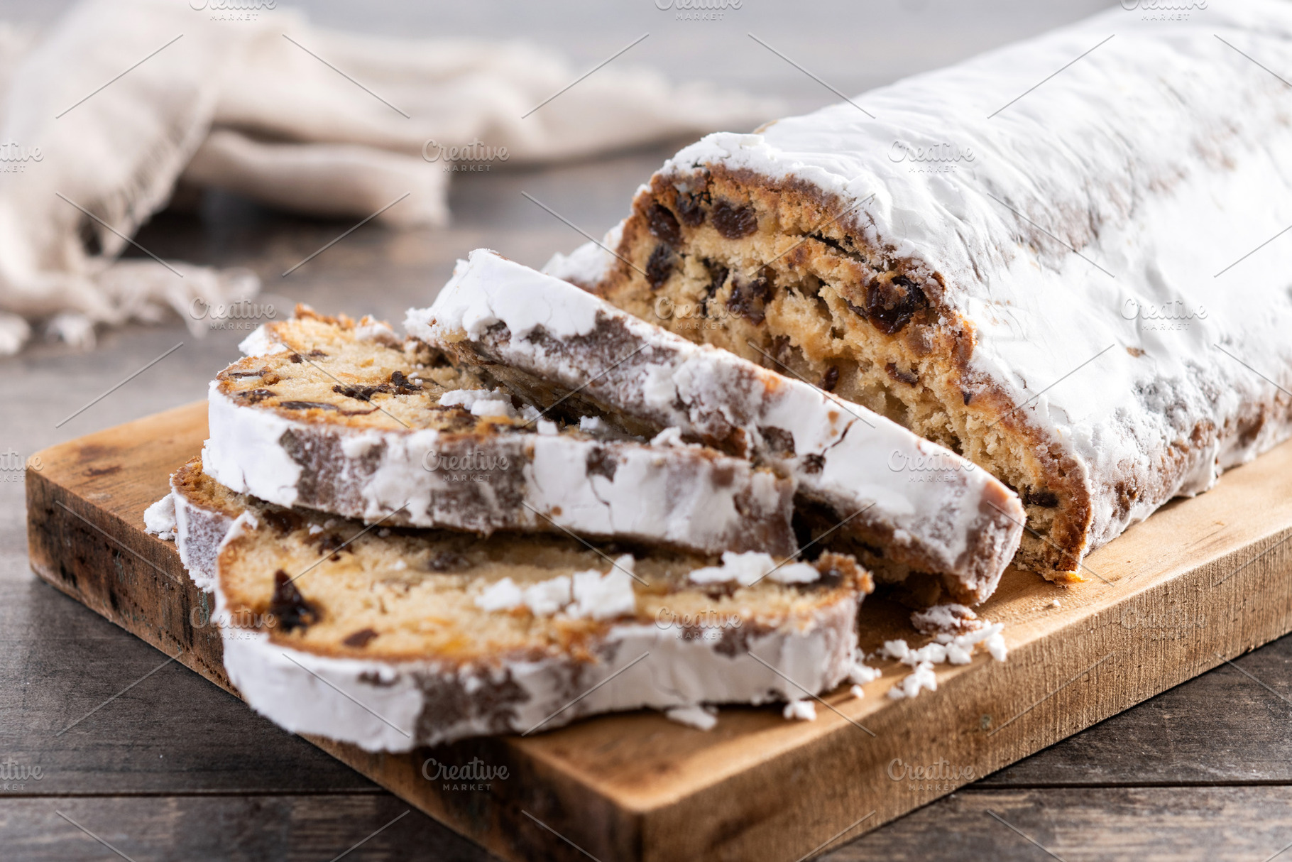 Traditional Christmas Stollen with Raisins and Powdered Sugar, a Food & Drink Photo by etorres69