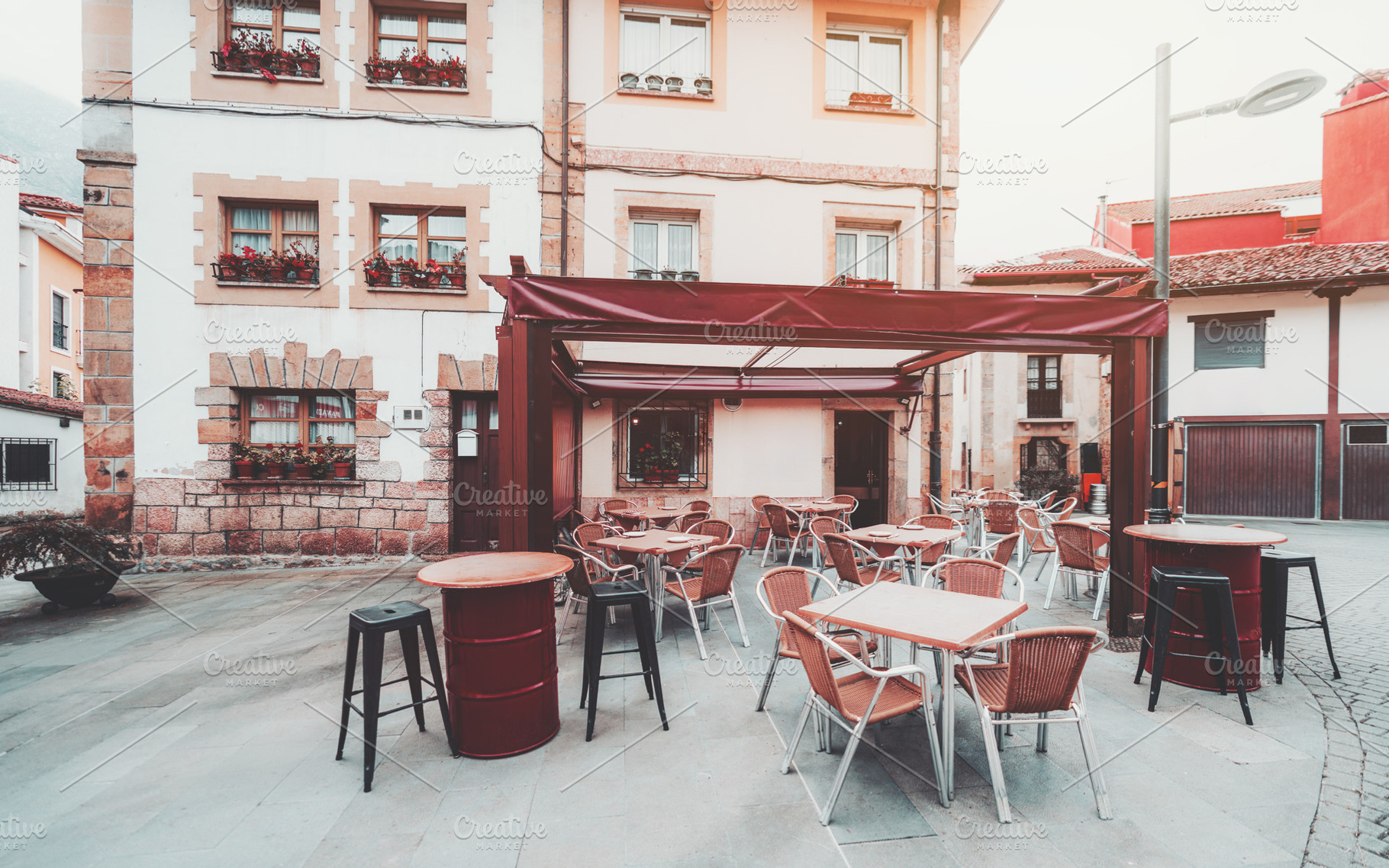 Empty cafe terrace in old town, an Industrial Photo by SkyNext