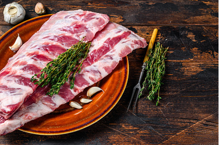 Raw pork loin spare ribs with thyme