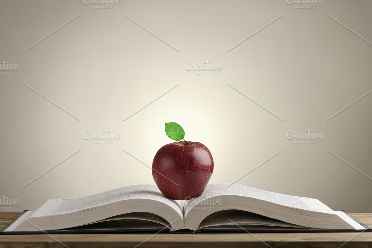 book with a red Apple, a School & Education Photo by Mamuka Gotsiridze (Photo 1 of 2)