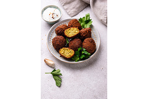 Middle Eastern falafel balls with, a Food & Drink Photo by Yulia Furman