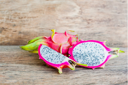 Healthy dragon fruits on old wooden, a Food & Drink Photo by Elizaveta Galitskaya