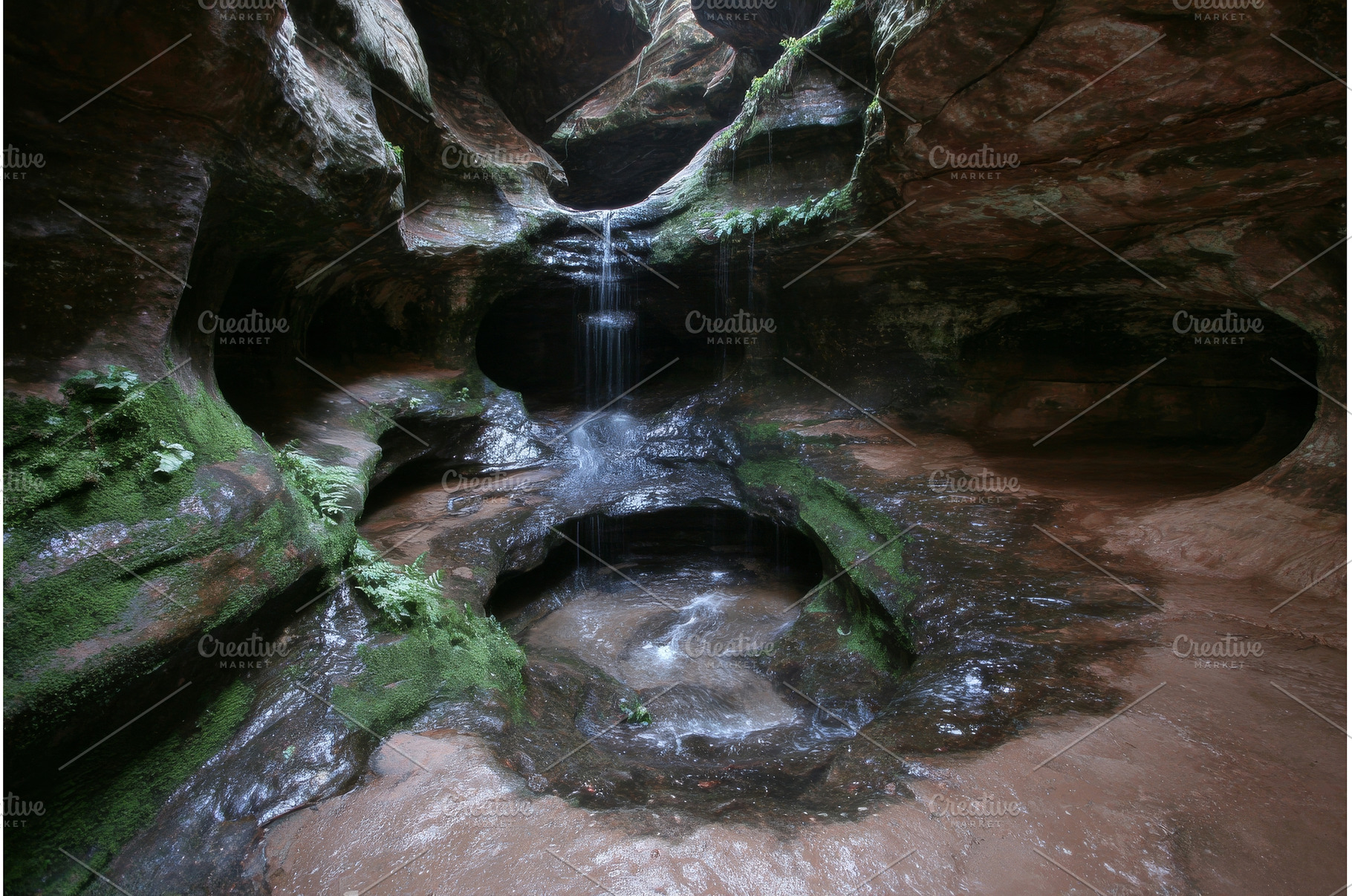 A waterfall is located in the back, a Nature Photo by ZinetroN