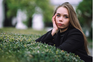 Thoughtful young woman in a black, a Beauty & Fashion Photo by Red Hot Chili Pepper Shop