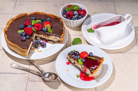 Homemade cheesecake with chocolate and berry, a Food & Drink Photo by Rimma
