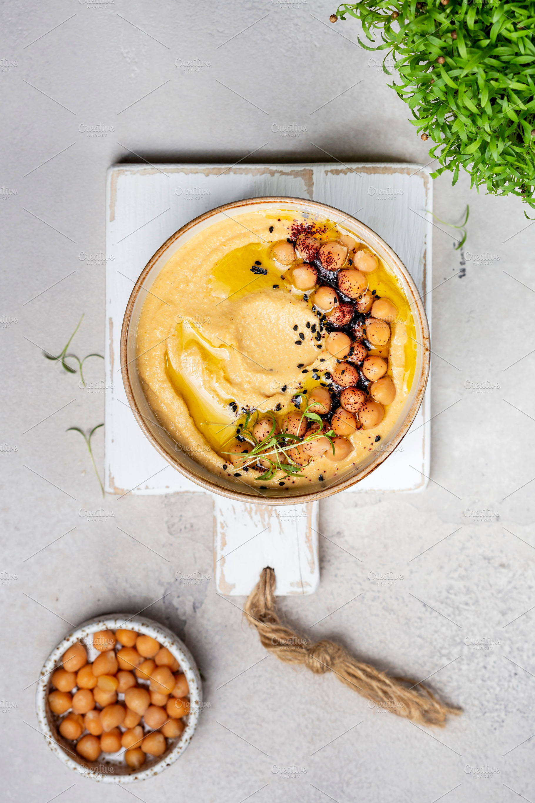 Traditional homemade chickpea hummus, a Food & Drink Photo by Marina_Pronina