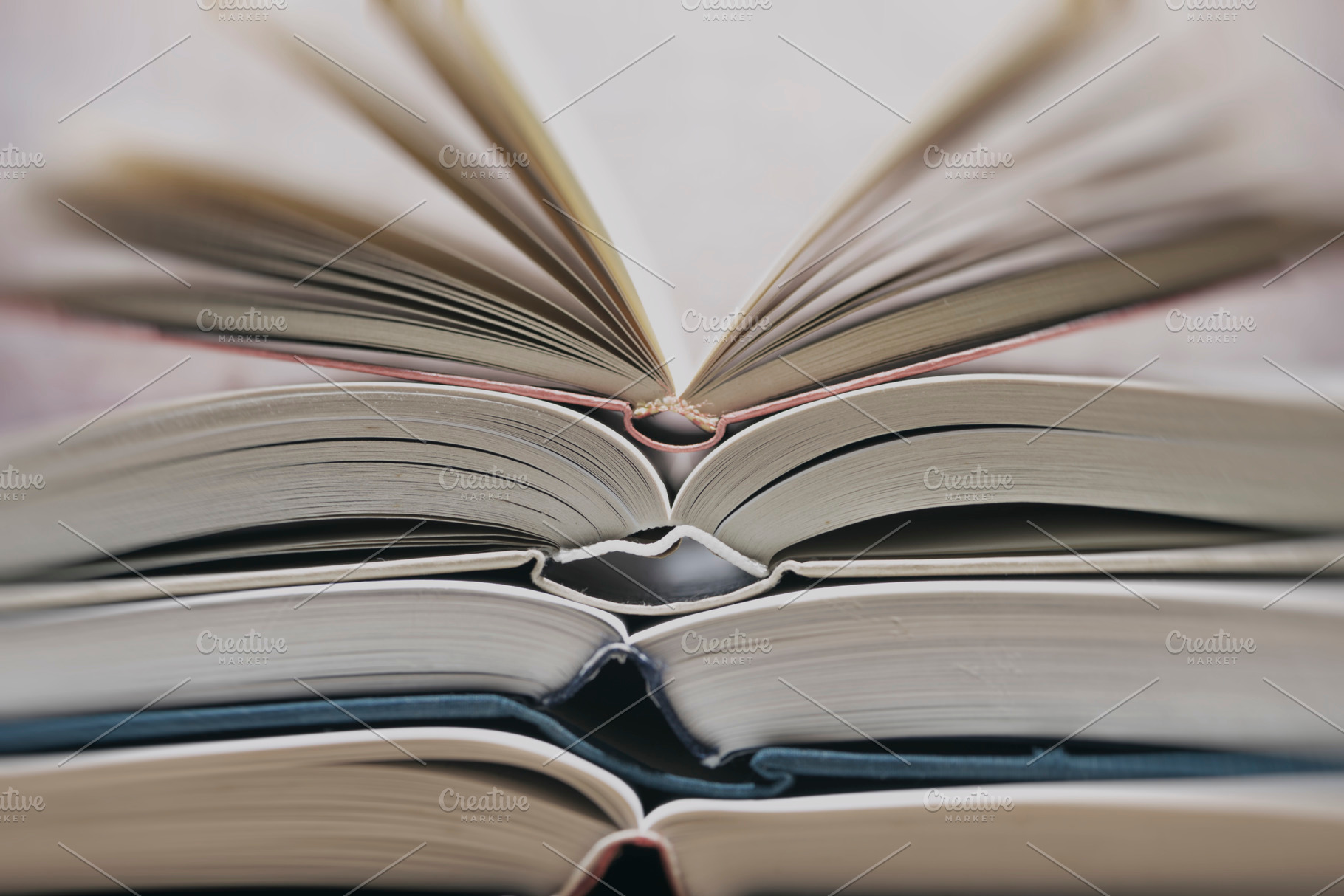 Several textbooks with white sheets stock photo containing book and open, a Nature Photo by Vicente Soler