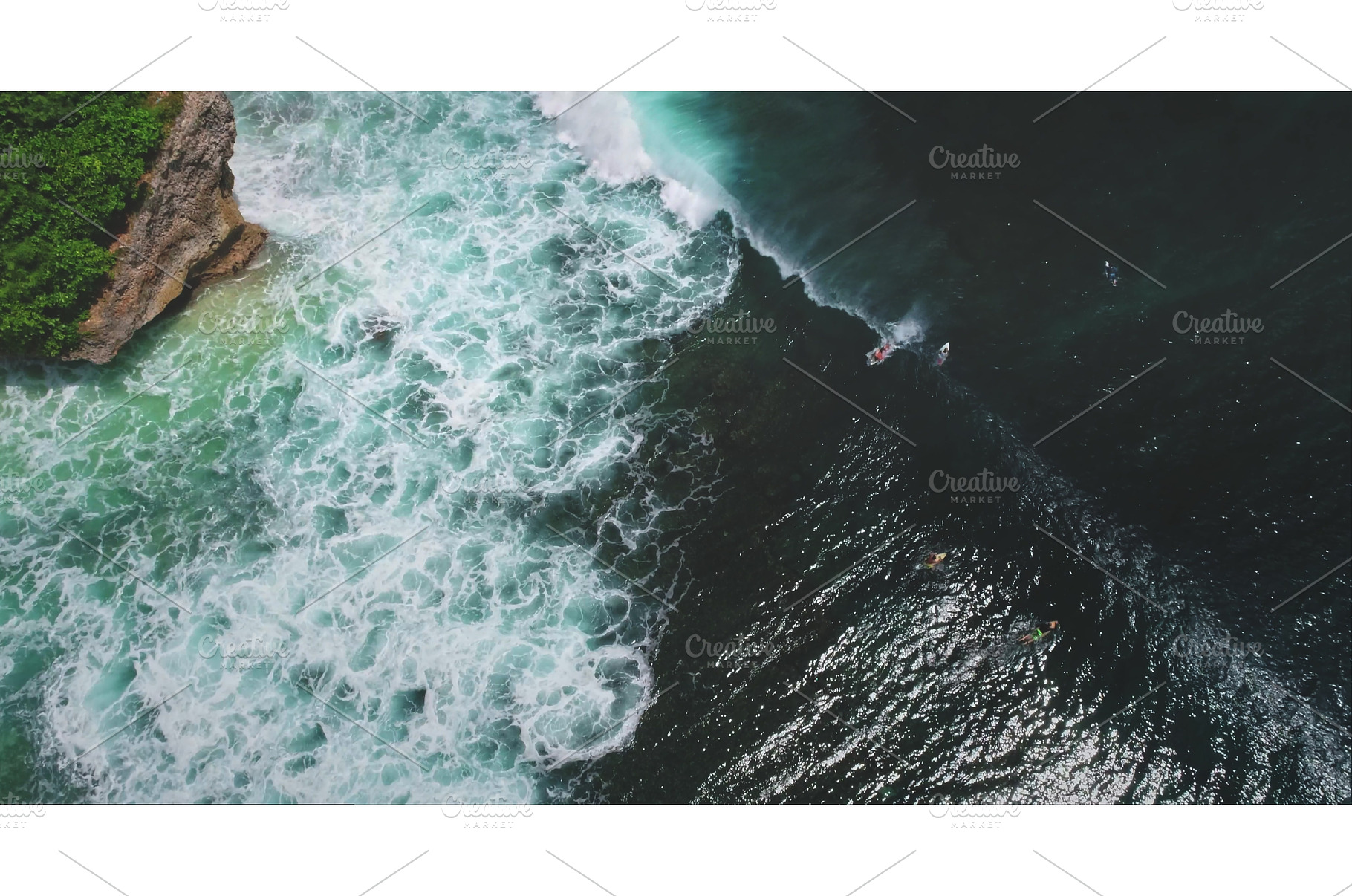 Surfers riding waves at Dreamland, a Nature Photo by Goinyk