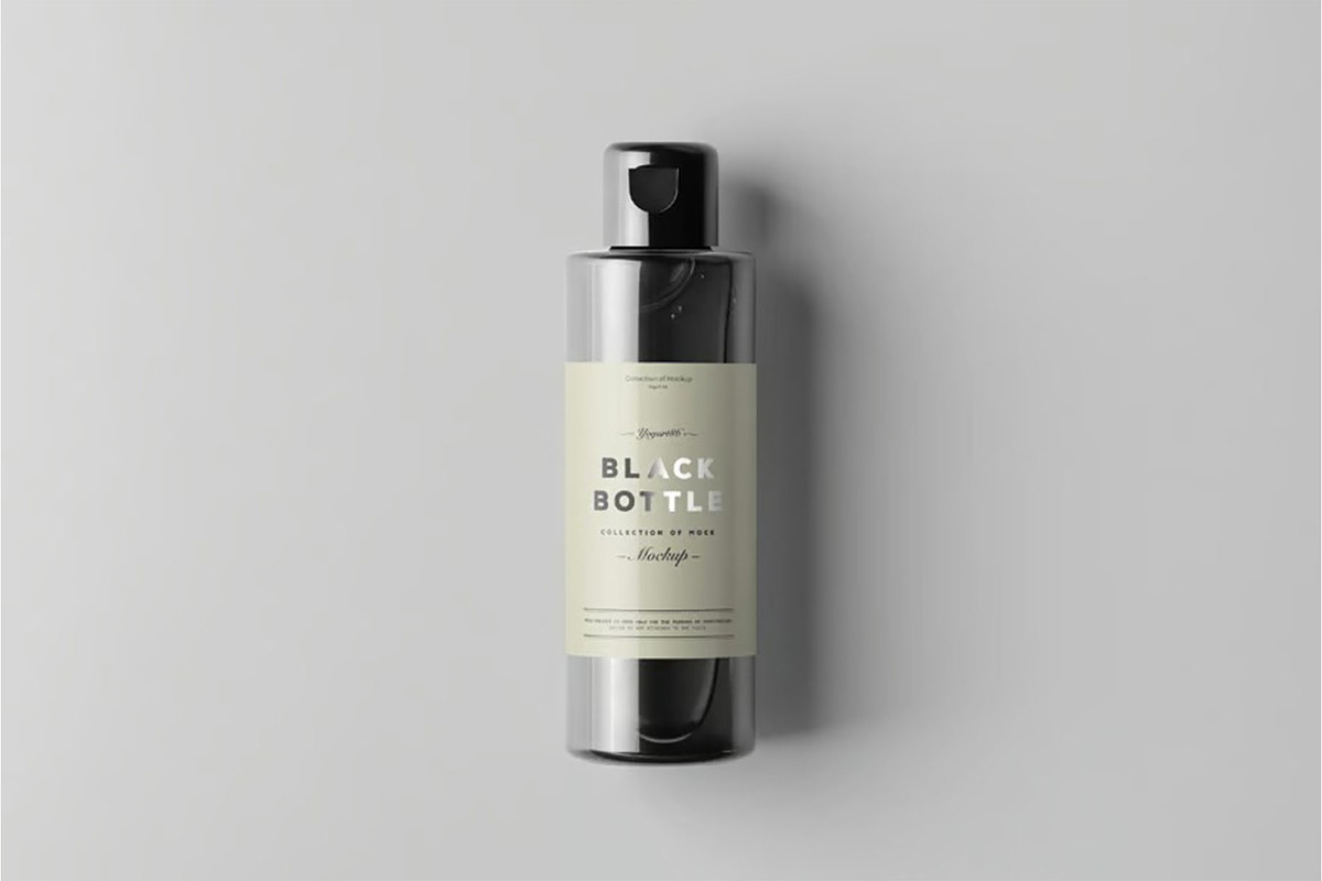 Black Bottles Cosmetic Mockup, a Packaging Mockup by DesignRushMarket (Photo 7 of 8)