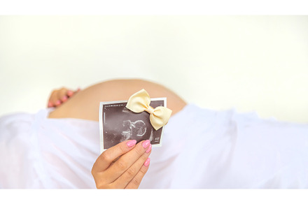 Pregnant woman with girl ultrasound, a Person Photo by yanadjana