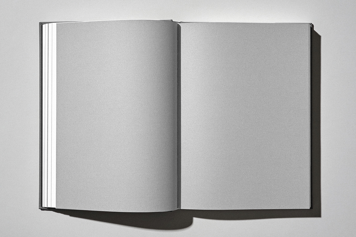 Open Hardcover Book Mockup, a Books & Magazine Mockup by Design Squad (Photo 2 of 4)