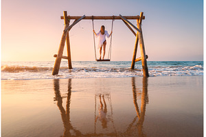 Happy young woman on wooden swing in, a Person Photo by den-belitsky