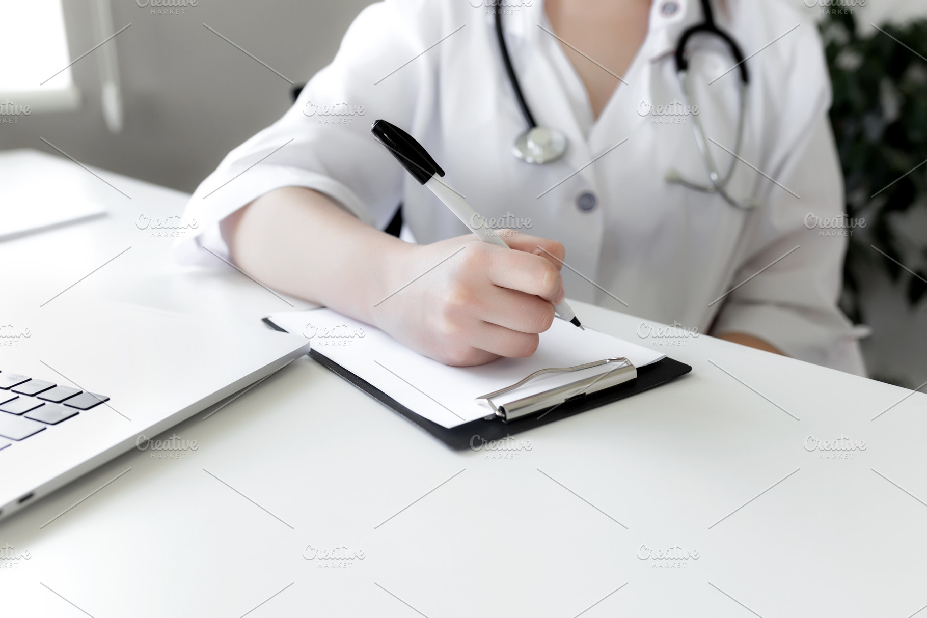 The doctor writes something, a Health & Medical Photo by Lenor4ik