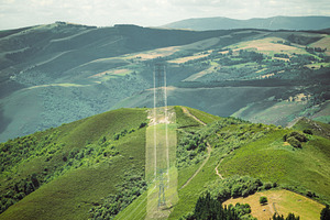 Power line on mountain hills, an Industrial Photo by SkyNext