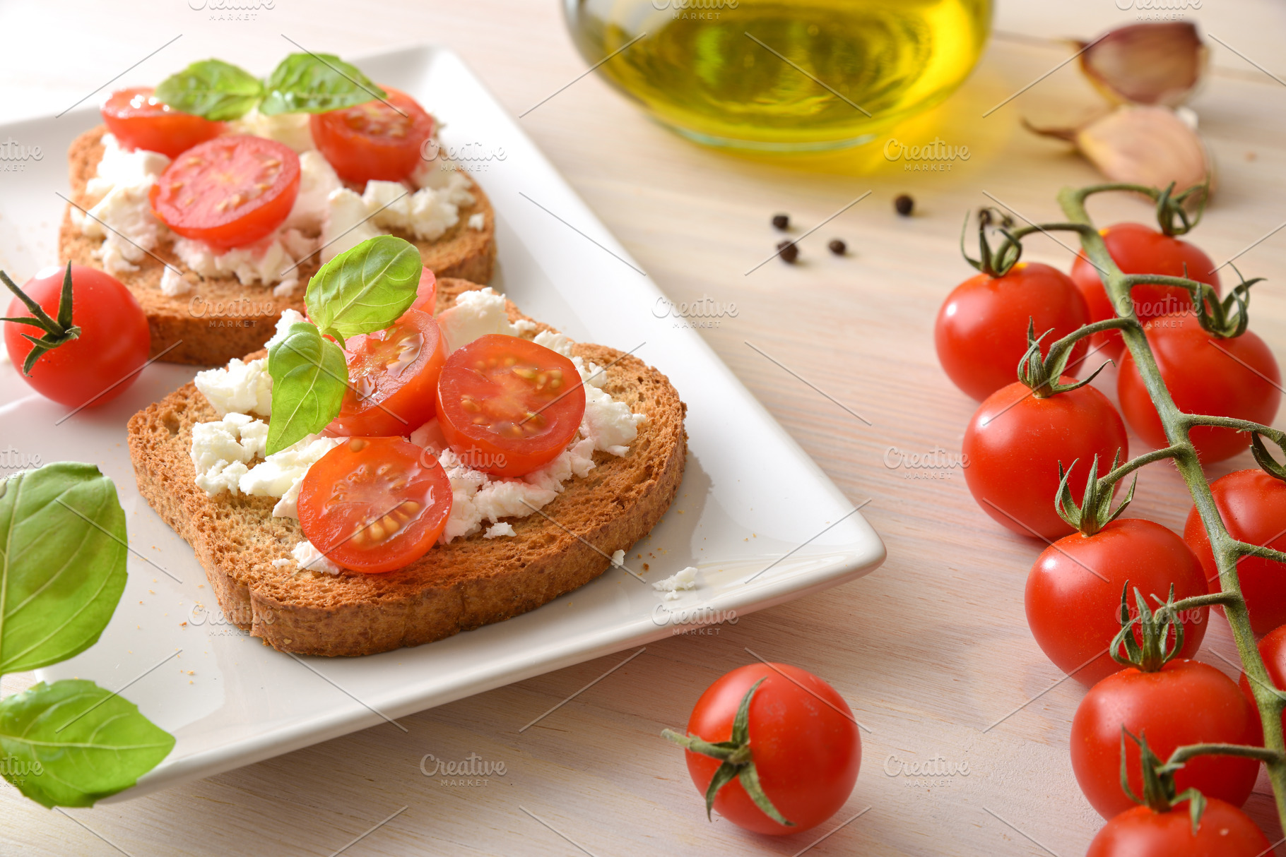 Tomato Ricotta Toasts on White Plate, a Food & Drink Photo by Davizro's Market