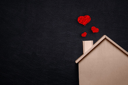 Home sweet home with red heart. Wooden house and Black leather b, an Arts & Entertainment Photo by Ministocker