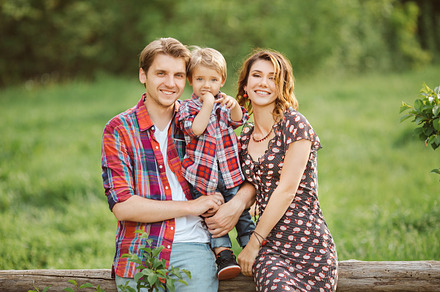 Happy family in a park stock photo containing child and son, a Person Photo by Emotion photo