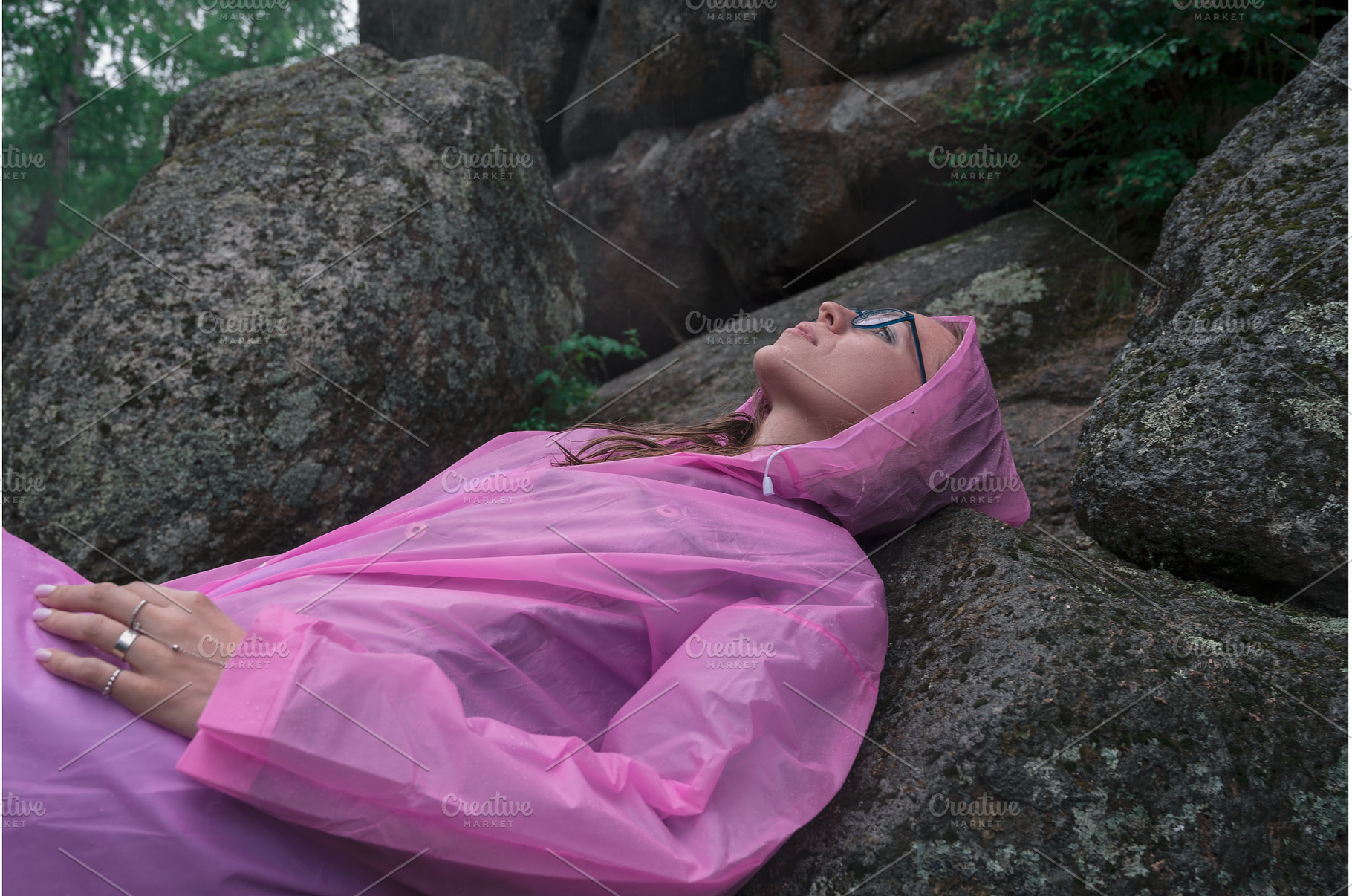 Woman in the taiga forest and rocks, a Person Photo by Jan Jack Russo Media