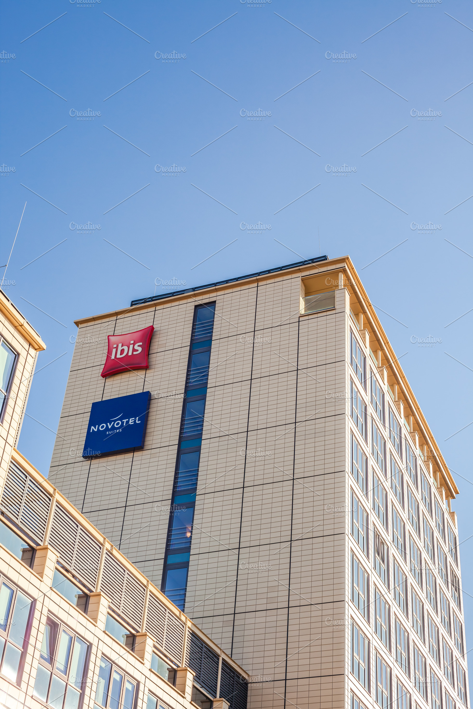 Novotel suites Ibis logo at hotel building Munich, an Architecture Photo by Dvoevnore photos