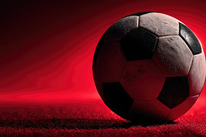 Black and White Soccer Ball on Red Background with Dramatic Spor, a Sports & Recreation Photo by José Manuel Gelpi