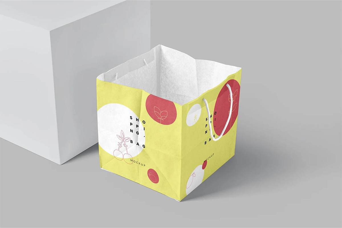 Square Kraft Shopping Bag Mockup, a Packaging Mockup by megostudi0 (Photo 6 of 7)